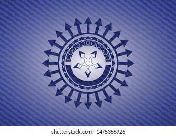 ninja star icon inside denim background