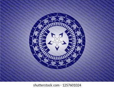 ninja star icon inside emblem with denim texture