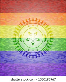 ninja star icon inside emblem on mosaic background with the colors of the LGBT flag