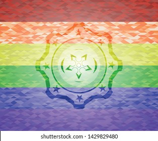 ninja star icon inside emblem on mosaic background with the colors of the LGBT flag