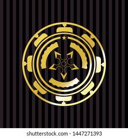 ninja star icon inside gold emblem or badge