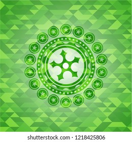 ninja star icon inside green emblem with mosaic background