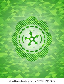 ninja star icon inside green emblem with mosaic ecological style background