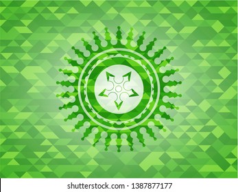 ninja star icon inside green emblem. Mosaic background
