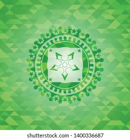 ninja star icon inside green emblem with triangle mosaic background