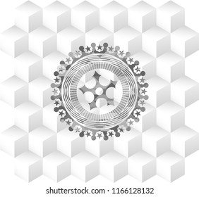 ninja star icon inside grey badge with geometric cube white background