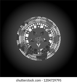 ninja star icon inside grey camouflaged emblem