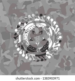 ninja star icon inside grey camo emblem