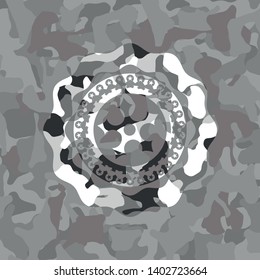 ninja star icon inside grey camo emblem