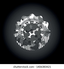 ninja star icon inside grey camouflaged emblem