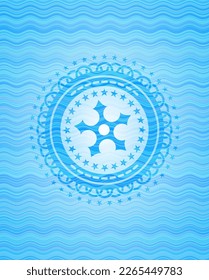 ninja star icon inside light blue water badge. 