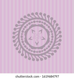 ninja star icon inside pink emblem