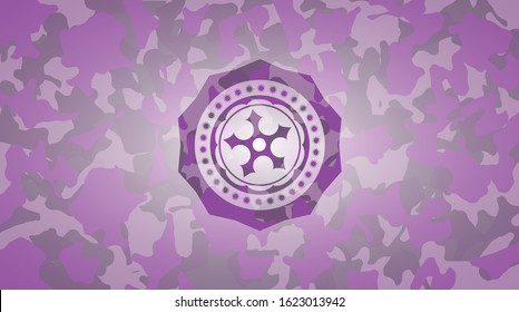 ninja star icon inside pink and purple camouflage texture