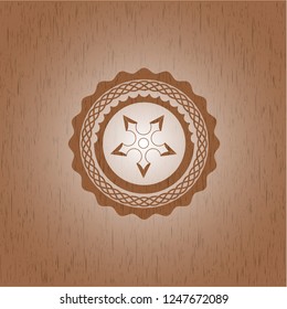 ninja star icon inside realistic wood emblem
