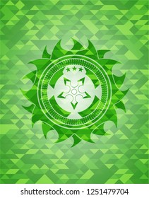 ninja star icon inside realistic green emblem. Mosaic background