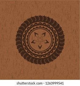 ninja star icon inside realistic wood emblem