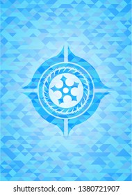 ninja star icon inside realistic light blue emblem. Mosaic background
