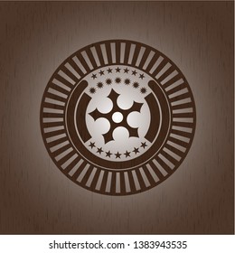 ninja star icon inside realistic wood emblem