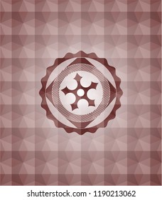 ninja star icon inside red seamless badge with geometric pattern background.