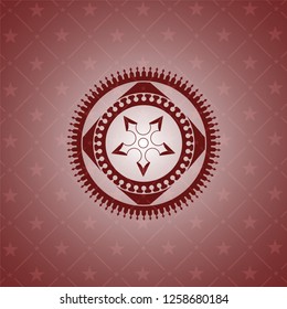 ninja star icon inside red emblem