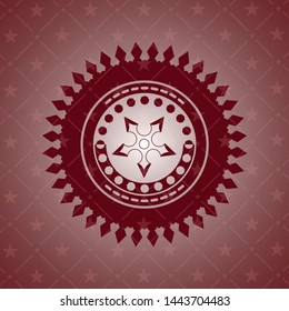 ninja star icon inside red emblem