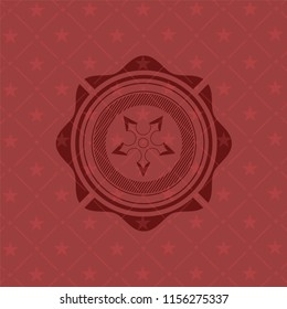 ninja star icon inside retro red emblem