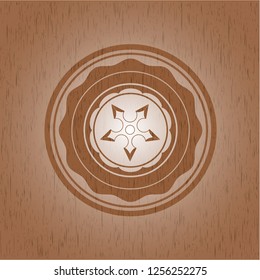 ninja star icon inside retro wooden emblem