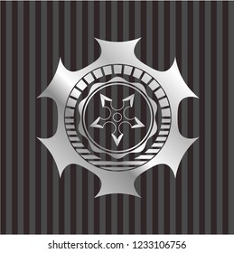 ninja star icon inside silver shiny badge