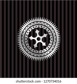 ninja star icon inside silver badge or emblem