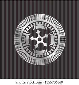 ninja star icon inside silver emblem or badge