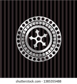 ninja star icon inside silver emblem