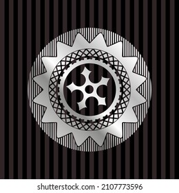 ninja star icon inside silver emblem or badge. 