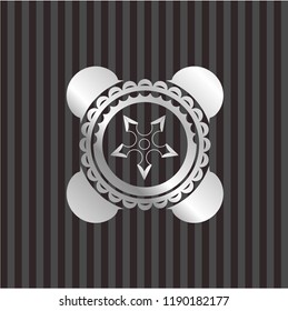 ninja star icon inside silvery emblem