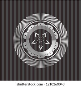 ninja star icon inside silvery emblem or badge