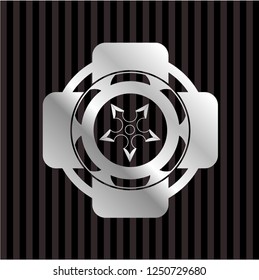 ninja star icon inside silvery badge