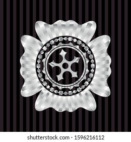 ninja star icon inside silvery badge or emblem