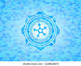 ninja star icon inside sky blue emblem. Mosaic background