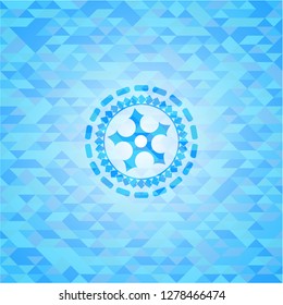 ninja star icon inside sky blue emblem with mosaic background