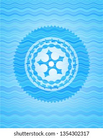 ninja star icon inside sky blue water wave emblem background.