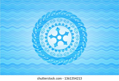 ninja star icon inside sky blue water badge background.