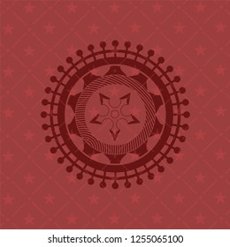 ninja star icon inside vintage red emblem