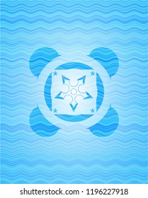 ninja star icon inside water emblem.