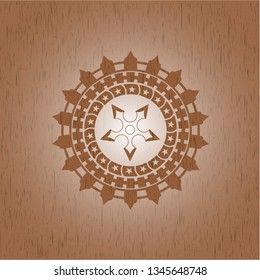 ninja star icon inside wood badge or emblem