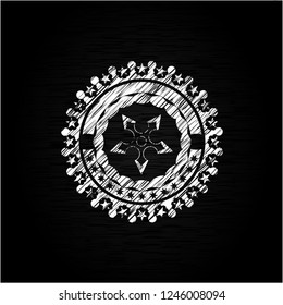 ninja star icon on chalkboard