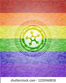 ninja star icon on mosaic background with the colors of the LGBT flag