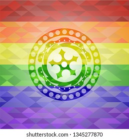 ninja star icon on mosaic background with the colors of the LGBT flag