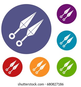 Ninja weapon kunai, throwing knives icons set in flat circle red, blue and green color for web