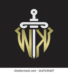 NK Logo monogram with sword and shield combination isolated with gold colors