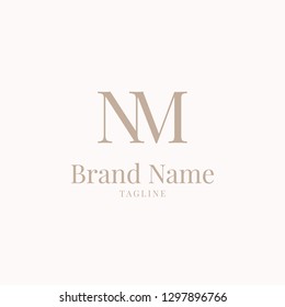 NM logo elegance golden brown