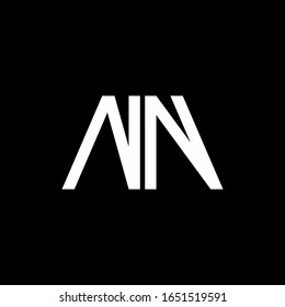 Monograma abstracto del logotipo NN aislado en fondo negro